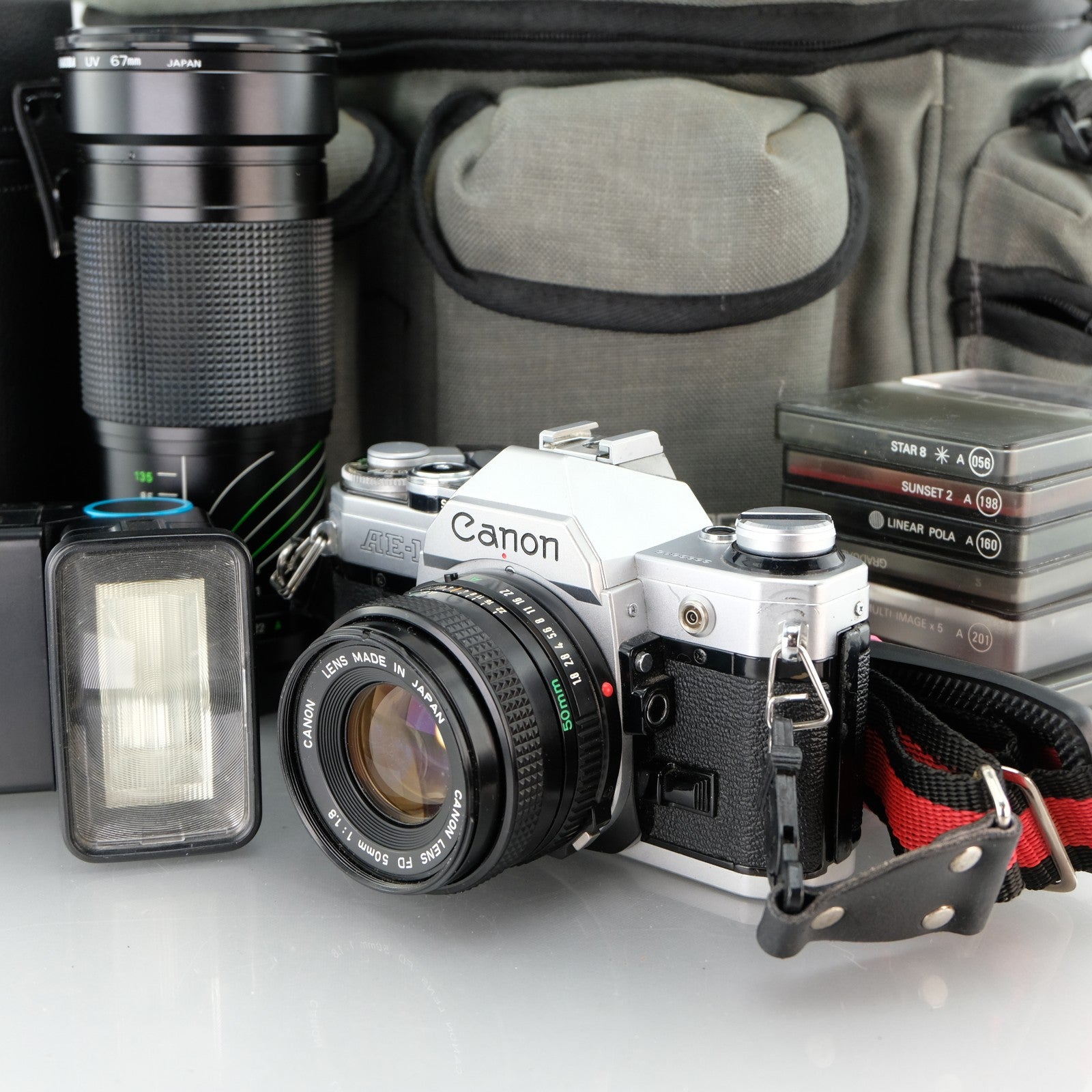 Canon AE-1 35mm Film Camera + 50mm f1.8 Lens + 28-135mm + Cokin Filter Kit Set